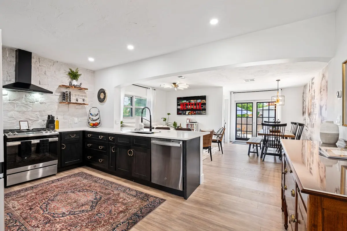 Welcome to your modern home base! This stylish open-concept kitchen flows seamlessly into the living and dining areas, perfect for gathering, cooking, and relaxing in style.