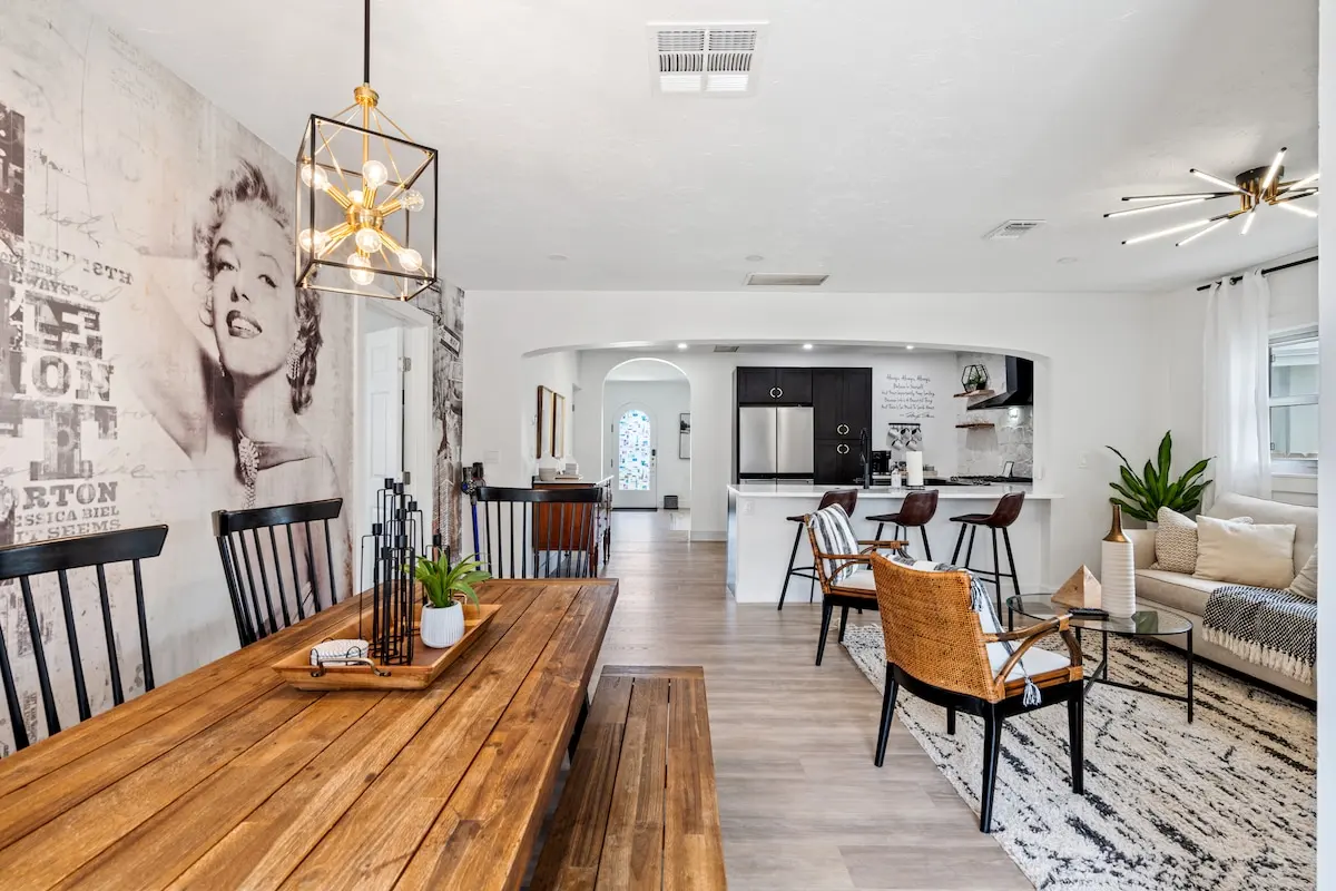 Here’s your full view from the dining room to the kitchen and lounge — open, airy, and perfect for gathering with your crew.