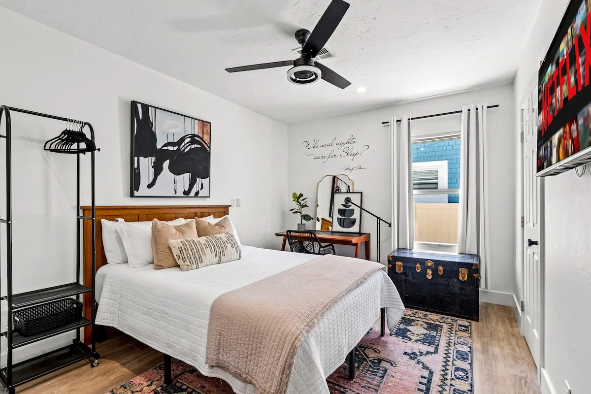 Quiet, light, and styled for travelers who need a workspace as much as a bed.