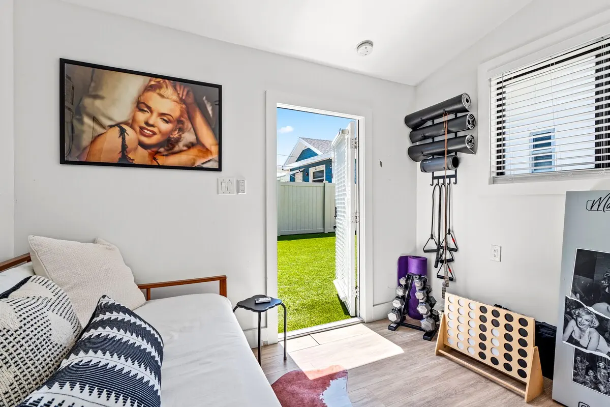 A light-filled retreat that opens right into the yard Yoga, games, or a quick recharge—your call.