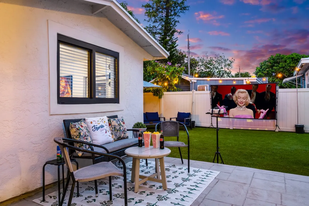 Your private outdoor movie night awaits! Kick back with popcorn under the string lights and enjoy classic films on our oversized screen — yes, Marilyn makes a cameo.