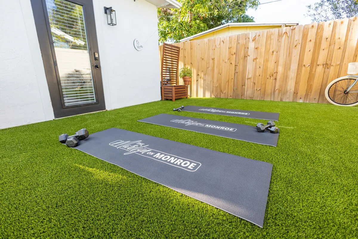 Bring your workout outside with our branded yoga mats + hand weights on soft turf—because vacation doesn’t mean skipping your flow ♀️